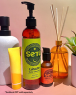 Setu skincare products including Lávate daily cleanser and Protégte vitamin C serum with decorative items