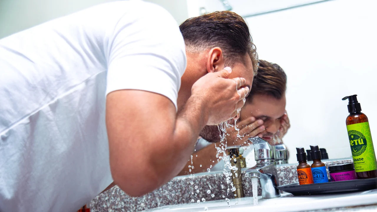 man washing face with lavate setu