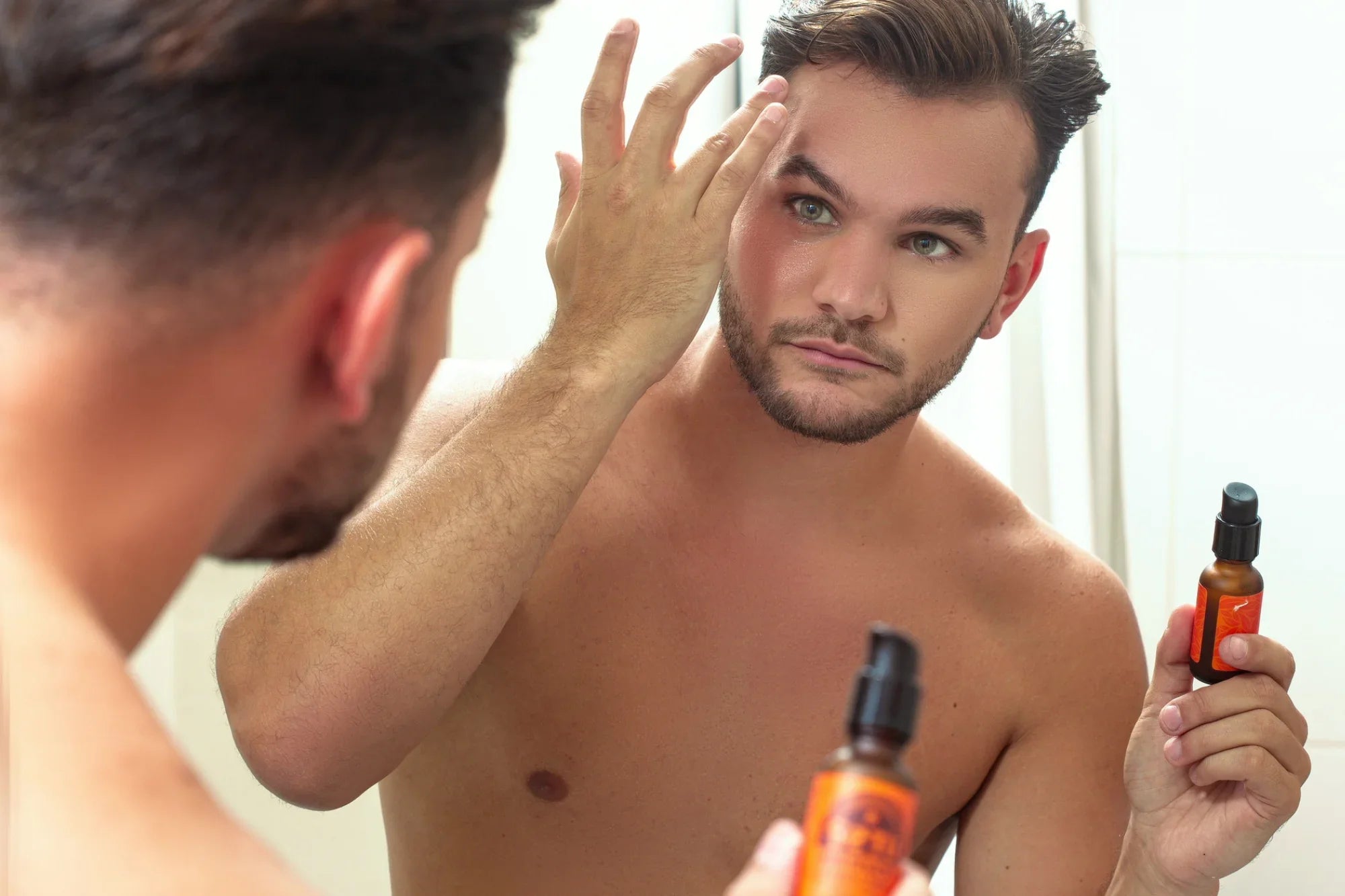Man Using VItamin C Serum