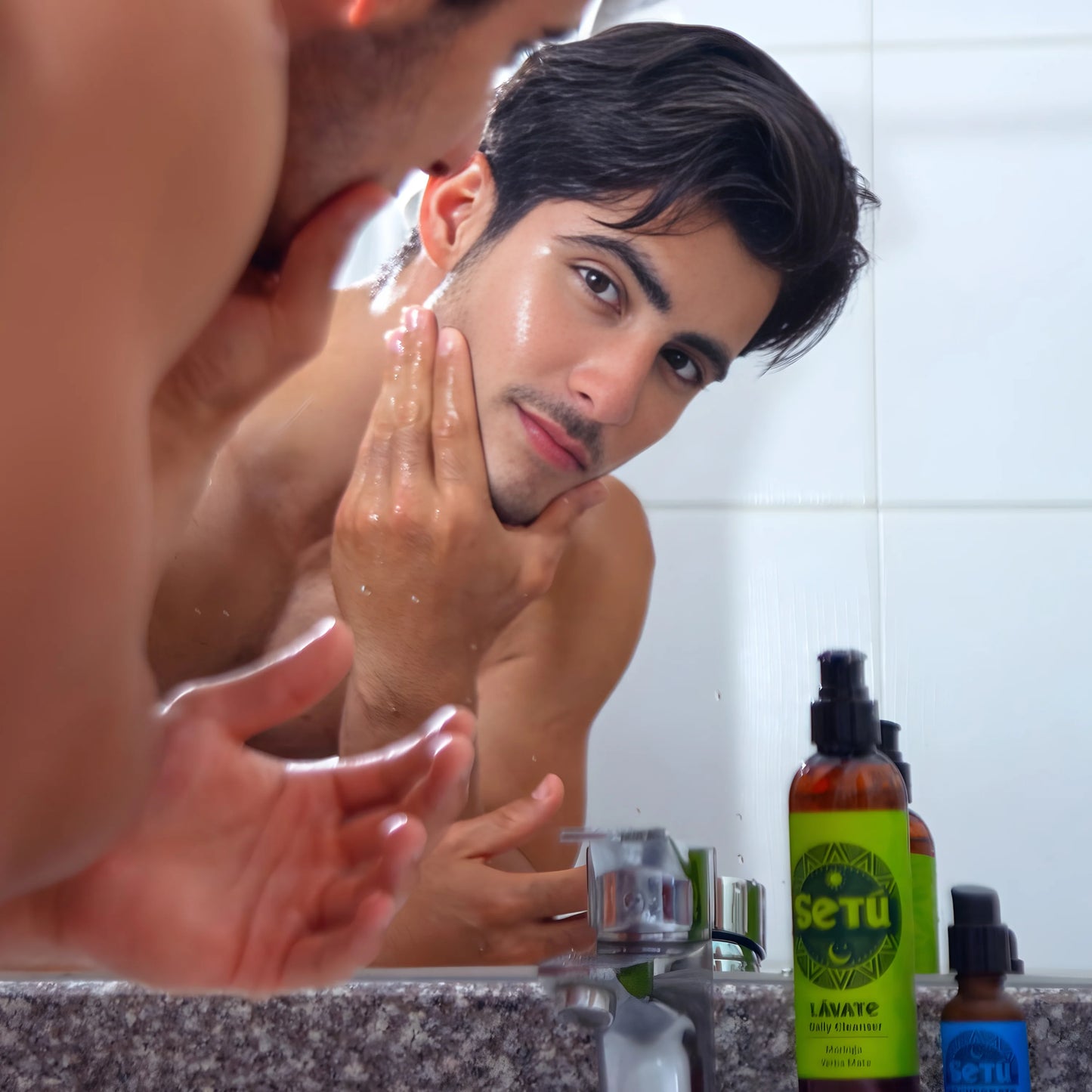Man applying soap to his hands with a bottle of 'Seru' soap visible in the foreground.