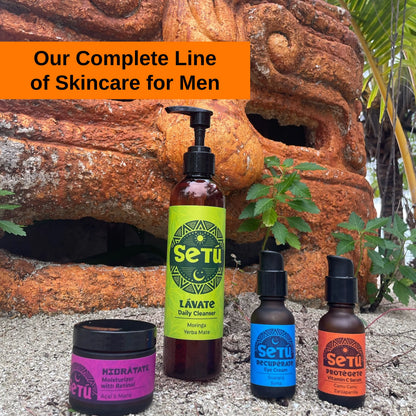 Setu skincare products for men displayed in front of a stone sculpture with plants.