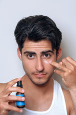 Latino_man_applying_Setu_Eye_Cream_with_Guarana - Setú® Skincare for Men with Latin American Ingredients