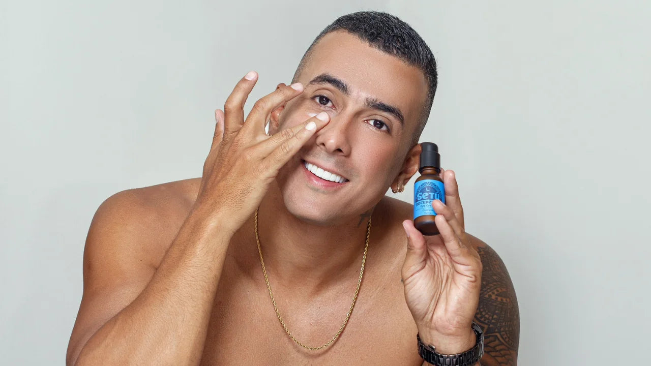 A shirtless man with setu eye cream