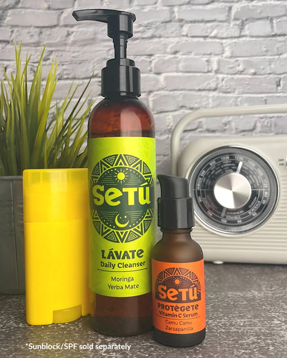 Two bottles of Setu skincare products including a daily cleanser and a vitamin c serum made for men with latino ingredients