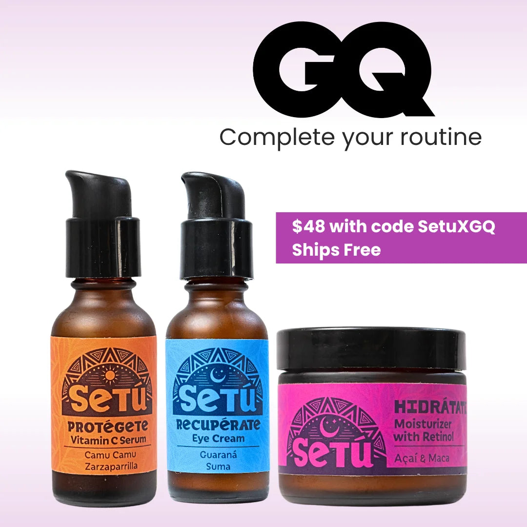 Three Setu skincare bottles and a jar on a pale pink gradient background with a large black GQ logo and promotional text. The products include a Vitamin C Serum in an amber bottle with an orange label, an Eye Cream in an amber bottle with a blue label, and a Moisturizer in a dark jar with a pink label.