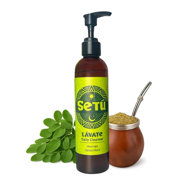 Setu daily cleanser bottle with green label, leaves, and a traditional cup on a white background