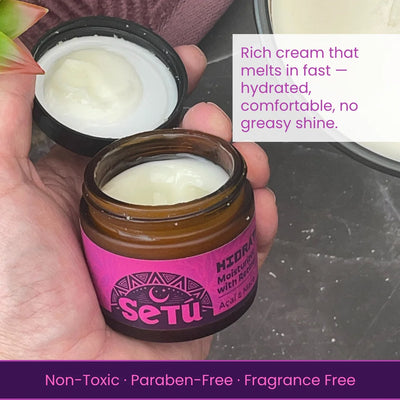 Men's retinol moisturizer jar opened, creamy lotion scooped with hands