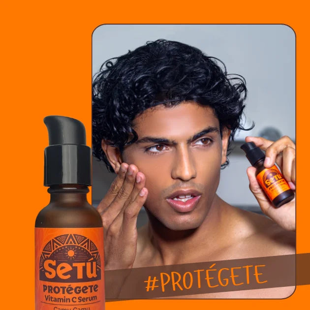 Man applying Setu Vitamin C Serum with an orange background