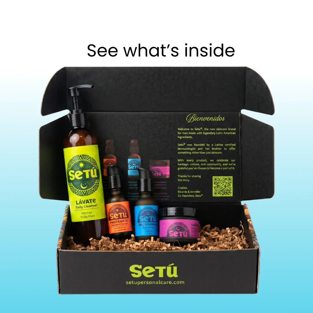 Men's skincare routine gift set box opened with bottles and small jars inside