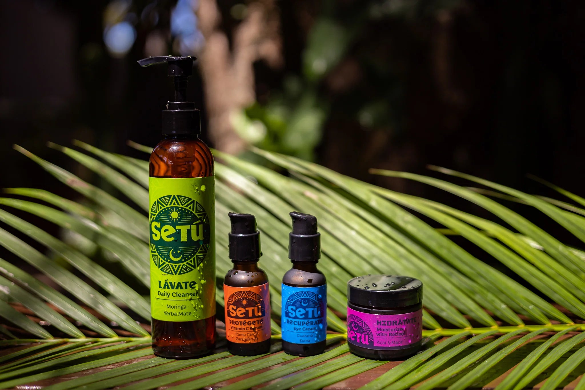 Setu skincare products on a palm leaf with a blurred natural background